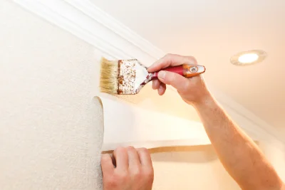 Pose de papier peint à Herm — revêtements muraux et toiles de verre